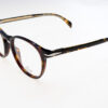 David Beckham Montature vista uomo Db 7137 1093018075418 140-54-18 - Montatura da vista uomo David Beckham DB 7137 in acetato nero con dettagli trasparenti, misura 54‑18‑140 mm (cod. 109301‑8075418), stile rettangolare moderno e raffinato.