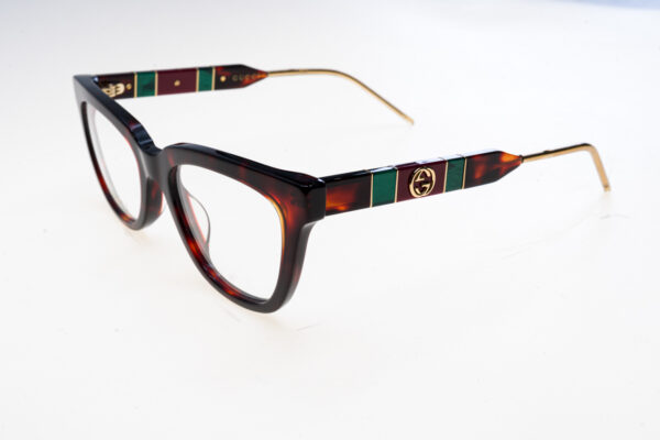 Gucci Montature vista donna GG0601O 30008108002 145-50-19 - Montatura da vista donna Gucci GG0601O in acetato tortora/ocra, misura 50‑19‑145 mm, design bold oversize con dettagli logo sulle aste e finitura elegante per un look distintivo.